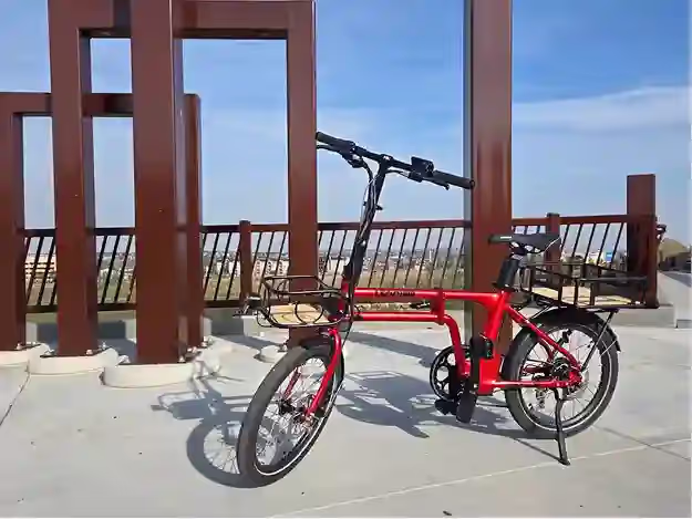 The Real Deal on Folding E-Bikes: Testing 9 Models That Actually Matter Description: This comprehensive article chronicles Toyota's evolution from hybrid pioneer to electric vehicle powerhouse, featuring an in-depth analysis of the upcoming 2026 C-HR BEV and a compelling first-person argument for why Toyota represents the best choice among electric carmakers based on their unmatched reliability, extensive service network, and decades of electrification expertise. Keywords: foldable electric bike, folding electric bike, fold up electric bike, collapsible electric bike Man, I thought folding electric bikes were stupid. Like, really stupid. Two years ago, when my cycling buddy rolled up on what looked like a Transformer that someone had half-folded and slapped a motor on, I actually laughed out loud. The thing had these tiny wheels, this weird hinge in the middle, and it made him look like he was riding a motorized shopping cart. I couldn't understand why anyone would choose that over a proper e-bike. Fast forward to now, and I'm writing this article on my laptop while my own folding e-bike sits next to my desk at work. Yeah, I became one of those people. And you know what? I don't care if it makes me look ridiculous, because this thing has completely changed how I move around the city. The wake-up call came during a camping trip last summer. Five of us wanted to bring bikes, but nobody's car could fit them without dealing with bike racks, roof mounts, or leaving someone behind. Then Jake shows up with his Lectric XP, and the damn thing folded down small enough to fit in his Civic's trunk alongside a cooler, tent, and sleeping bag. By Sunday, we'd all put 60+ miles on that little beast through forest roads, and I was already browsing folding e-bike reviews on my phone. That's when it hit me—these bikes aren't trying to be the fastest or prettiest things on two wheels. They're trying to solve the annoying parts of bike ownership that nobody talks about. And holy shit, do they ever solve them. Why Americans Are Finally Coming Around Europeans have been riding folding bikes forever because their cities force them to. Shoebox apartments, packed trains, medieval streets that barely fit a bicycle—compact transport isn't a luxury there, it's survival. Meanwhile, we Americans have been spoiled with garages, pickup trucks, and suburban sprawl that makes cramming a bike into small spaces seem unnecessary. But things are changing fast. RV sales went through the roof during COVID, and good luck mounting a bike rack on a 40-foot motorhome without scraping every drive-through you encounter. Urban housing keeps shrinking while prices keep climbing. More people are mixing bikes with public transit for their commute. And honestly, we're all getting sick of wrestling with bike racks every damn time we want to take our bikes somewhere fun. I've met retirees who fit three folding e-bikes in their RV where they used to struggle with one regular bike. City dwellers who finally own a decent bike without turning their studio into a bike storage facility. Even suburban parents who can throw bikes in the minivan for kids' activities without the roof rack drama. The tech finally caught up too. Five years ago, most folding e-bikes were either underpowered toys or heavy, unreliable messes. Today's models pack real power, decent range, and surprisingly solid build quality into frames that actually fold properly. Many have features that put full-size bikes to shame: fat tires, suspension, cargo racks, and motors that laugh at hills. How I Actually Test These Things Testing folding e-bikes isn't like reviewing regular bikes. Sure, speed and range matter, but there's this whole other layer of practical stuff that can make or break the experience. How fast does it fold? How compact does it get? Can you actually carry it without needing a chiropractor? I have this thing I call the 